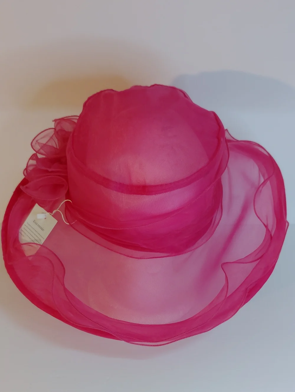 Elegant Hot Pink Organza Dress Hat with Floral Accent